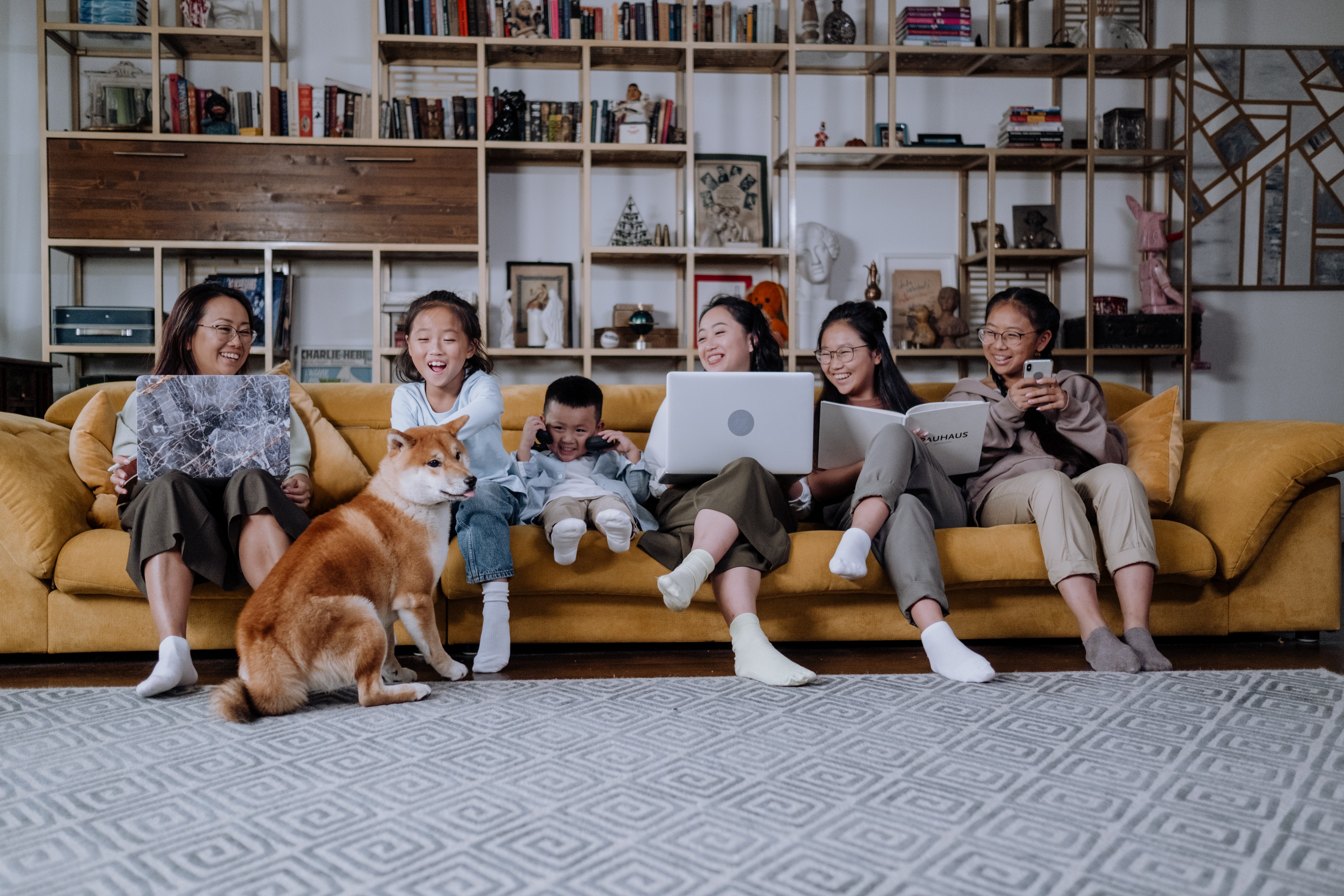 family sitting on couch